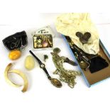 A box of mixed costume jewellery and other items.