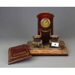 An Edwardian desktop clock and Edwardian notepad cover, clock H. 21cm.