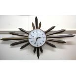 A Metamec 1960's battery operated sunburst wall clock, W. 86cm.