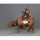 A Chinese bronze figure of a sage riding a water buffalo, H. 25cm.