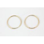 A pair of 9ct yellow gold hoop earrings, Dia. 1.6cm.