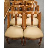 An impressive set of six leather recently upholstered 19th Century Arts and Crafts oak dining