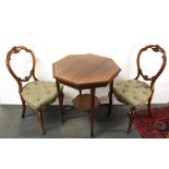 A pair of Victorian carved mahogany balloon backed dining chairs and an inlaid mahogany octagonal