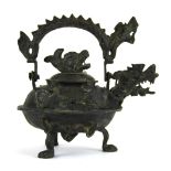 A 19th/ early 20th Century Oriental bronze dragon kettle, H. 22cm.