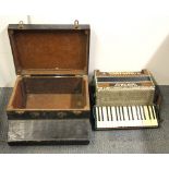 A wooden cased Soprani Italian piano accordion.