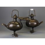 A superb pair of Chinese bronze goose shaped wine ewers, H. 34cm, L. 39cm.