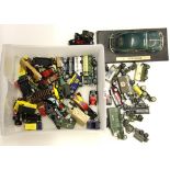 A box of mixed die cast metal model vehicles.