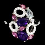 A 925 silver ring set with pear cut amethyst and pink tourmalines, (O.5).
