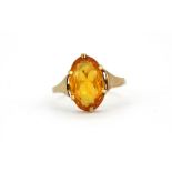 A 9ct yellow gold citrine set ring, (M).