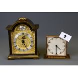A mid 20th Century Mappin gilt brass alarm clock. H. 8cm, together with a Swiza mantle clock.