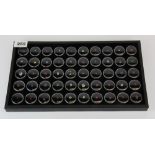 A tray containing 50 un-mounted gemstones, including diamond, tourmaline, ruby, amethyst, citrine,