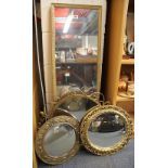 Four gilt framed mirrors, largest 33 x 104cm.