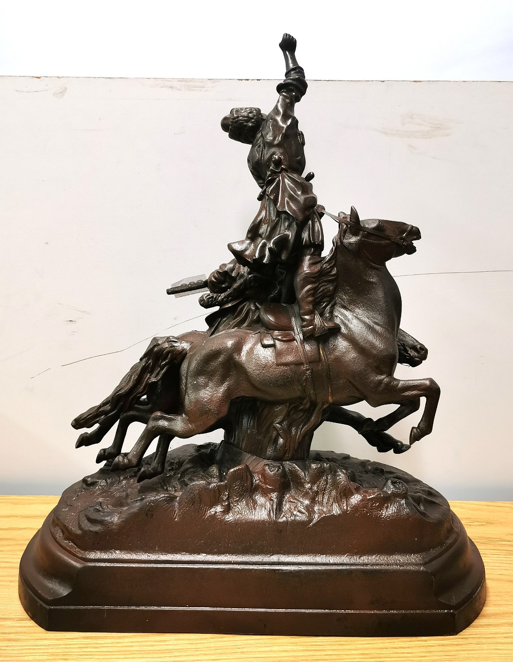 A 19th Century Russian cast iron figure of two women Revolutionaries with guns, swords and riding