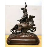 A 19th Century Russian cast iron figure of two women Revolutionaries with guns, swords and riding
