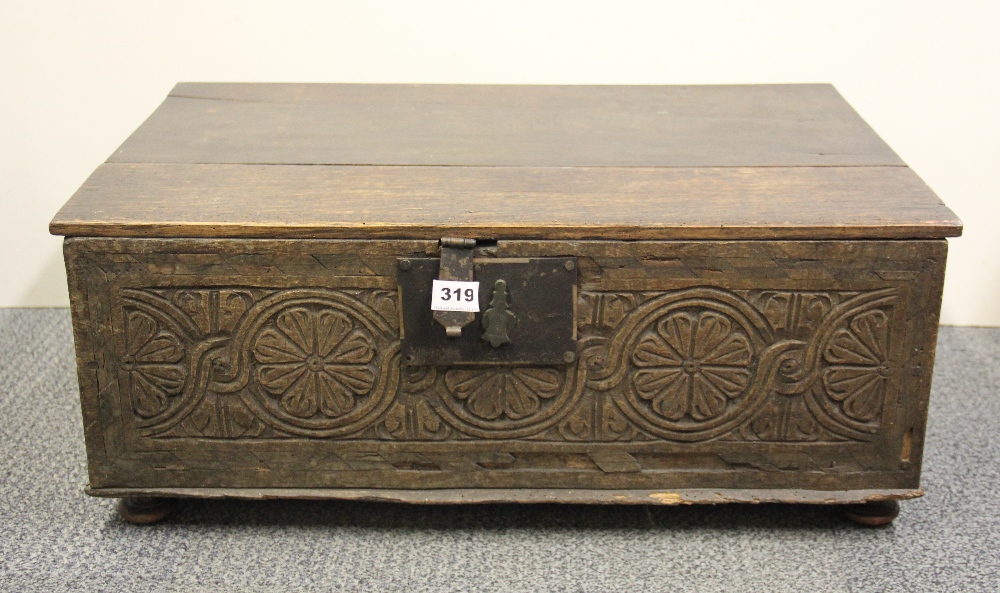 An 18th Century carved oak Bible box, 65 x 42 x 26cm.