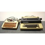 Two vintage portable typewriters.