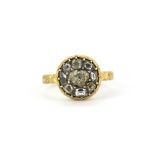 A 19th century yellow metal (tested high carat gold) diamond set ring, (N).