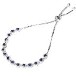 A 925 silver sapphire and white stone set adjustable bracelet.