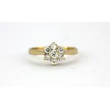 A 9ct yellow gold stone set cluster ring, (J).