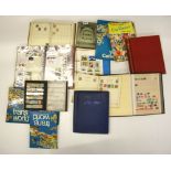 A group of mixed stamp albums and first day covers.