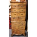 A Victorian mahogany veneered chest on chest, W. 95cm, H. 151cm.