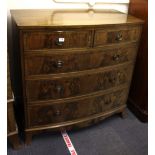 A matching bow front mahogany chest, W. 106cm, H. 107cm.