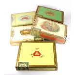 A box of un-opened Cuban cigars ( Monte Christo), an un-opened box of Jamaican cigars