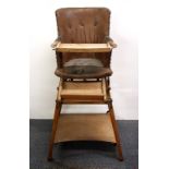 A Victorian child's upholstered metamorphic highchair with a decorated tray table and abacus.