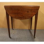 An early 19th Century mahogany drop leaf oval tea table, 67 x 96cm.