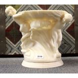 A large resin cherub bowl centrepiece, H. 33cm.