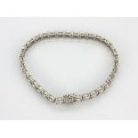 An 18ct white gold (stamped 750) bracelet set with brilliant cut diamonds, approx. 5.02ct overall,