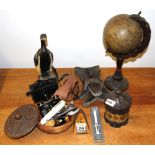 A carved wooden Globe and other interesting items.
