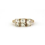 A 9ct yellow gold morganite and diamond set ring, (J.5).