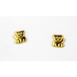 A pair of 9ct yellow gold teddy bear shaped stud earrings, L. 0.7cm.