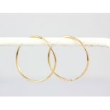 A pair of 9ct yellow gold hoop earrings, Dia. 2cm.