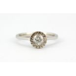 An 18ct white gold solitaire ring set with an approx. 0.50ct brilliant cut diamond, (N.5).