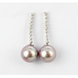 A pair off 18ct white gold drop earrings set with pink pearls and brilliant cut diamonds, L. 3.5cm,