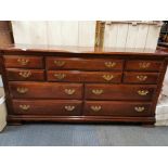 An impressive large ten drawer mahogany chest, W. 173cm H. 87cm.