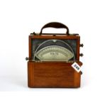 A mahogany cased Walters ELEC.MFG.Co Ltd London voltmeter, 21 x 21 x 9cm.