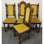 Two pairs of Victorian carved oak dining chairs.