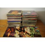 A large quantity of 33 RPM LP records.