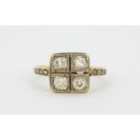 An early 20th century 18ct yellow gold and platinum (worn stamp) ring set with old cut diamonds,