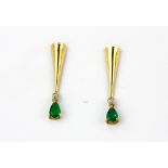 A pair of 9ct yellow gold emerald and diamond set drop earrings, L. 3cm.