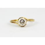 A 9ct yellow gold stone set solitaire ring, (L).