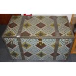 A large vintage metal and wood travelling trunk, 102 x 58 x 59cm.