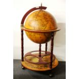 A globe style cocktail cabinet, H. 96cm.