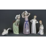 Five Lladro porcelain figures, tallest H. 25cm.