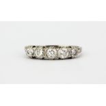 An 18ct white gold ring set with five brilliant cut diamonds, approx. 1.20ct overall, (V).