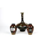 A 19th Century Japanese cloisonne vase together with a similar period pair of smaller vases, largest