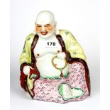 A Chinese hand painted porcelain figure of Putai. H. 23cm.